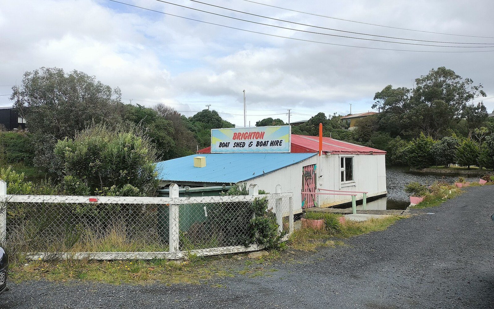 A boat shed interior with hulls under cover for winter
